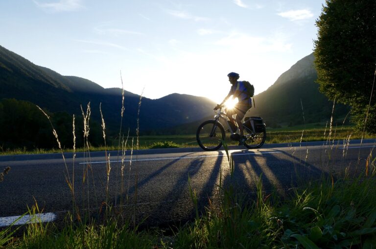 What are the advantages of using electric bikes for mountain trails?